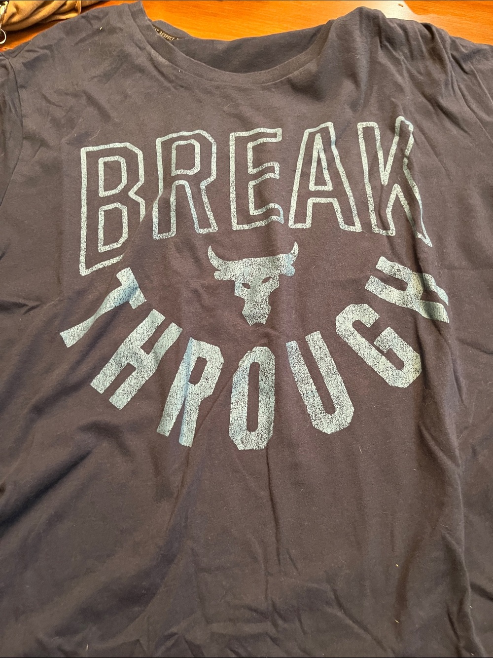 Under Armour Black Crewneck Tee with Light Blue 'Break Through' Graphic